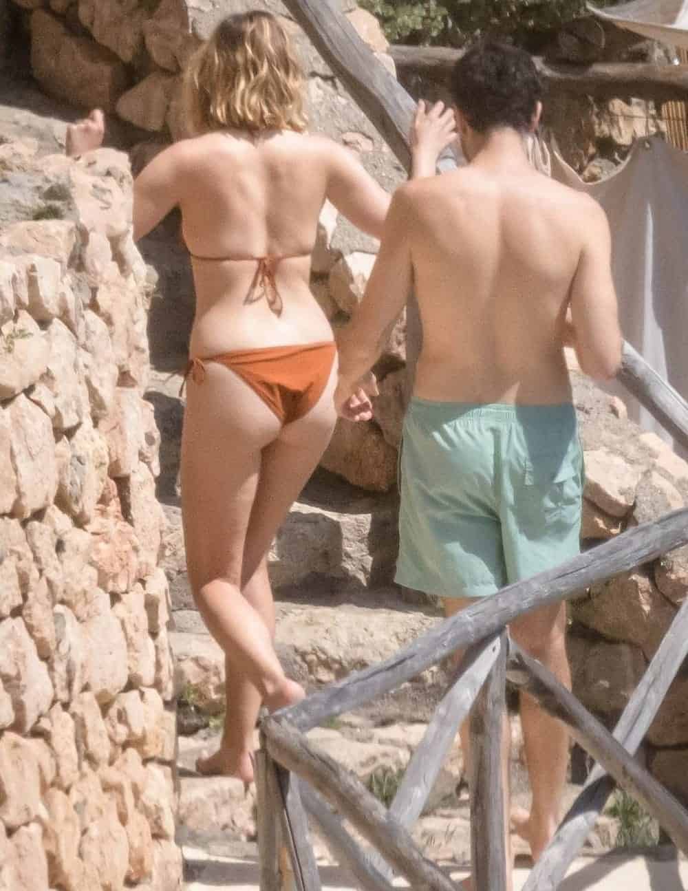 Elizabeth Olsen Flaunts her Incredible Body in a Brown Bikini in Italy