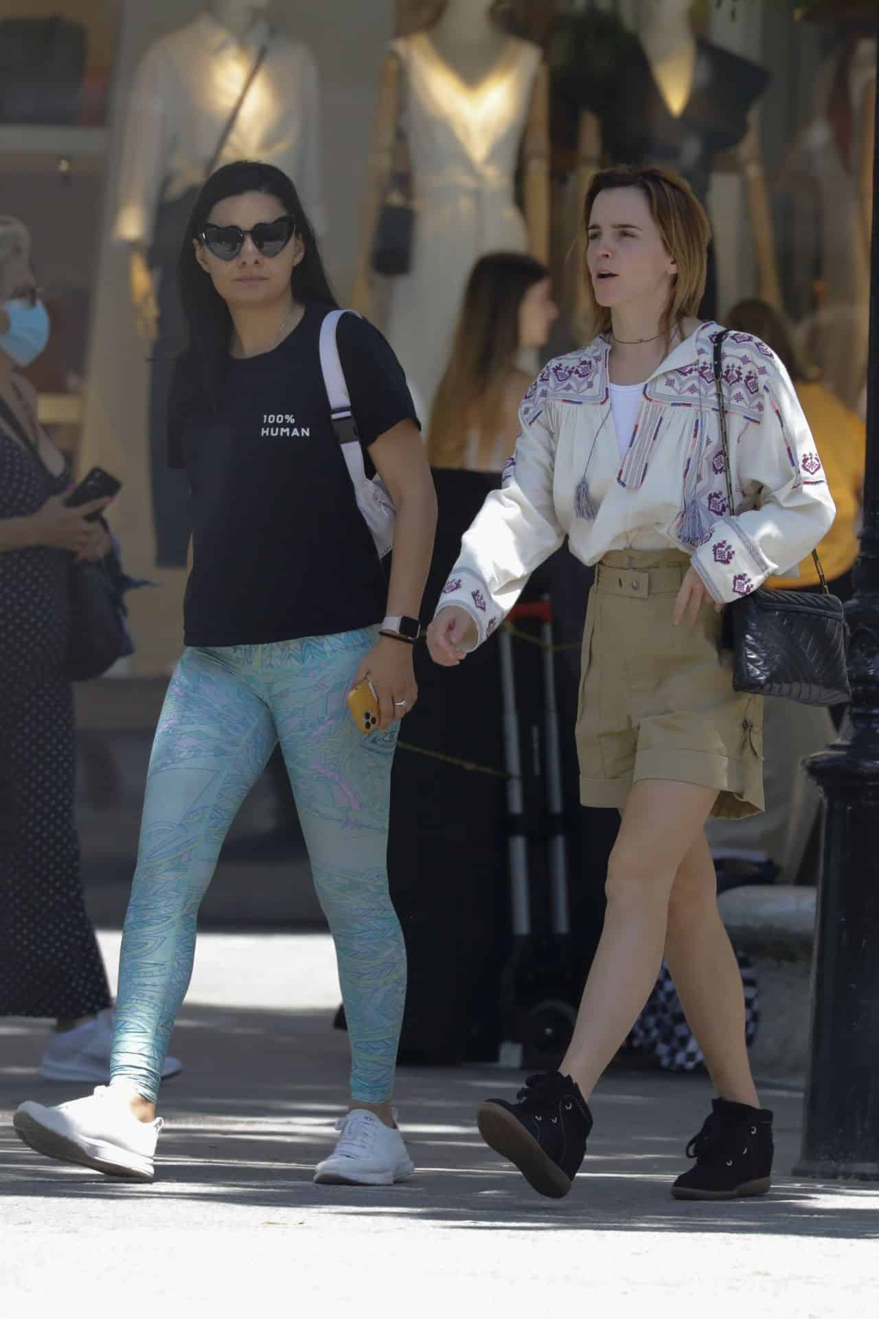Emma Watson Flaunts Toned Legs in Khaki Shorts while Shopping in Barcelona