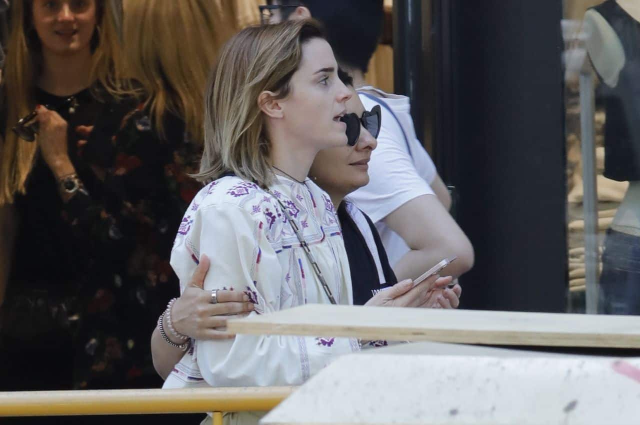 Emma Watson Flaunts Toned Legs in Khaki Shorts while Shopping in Barcelona