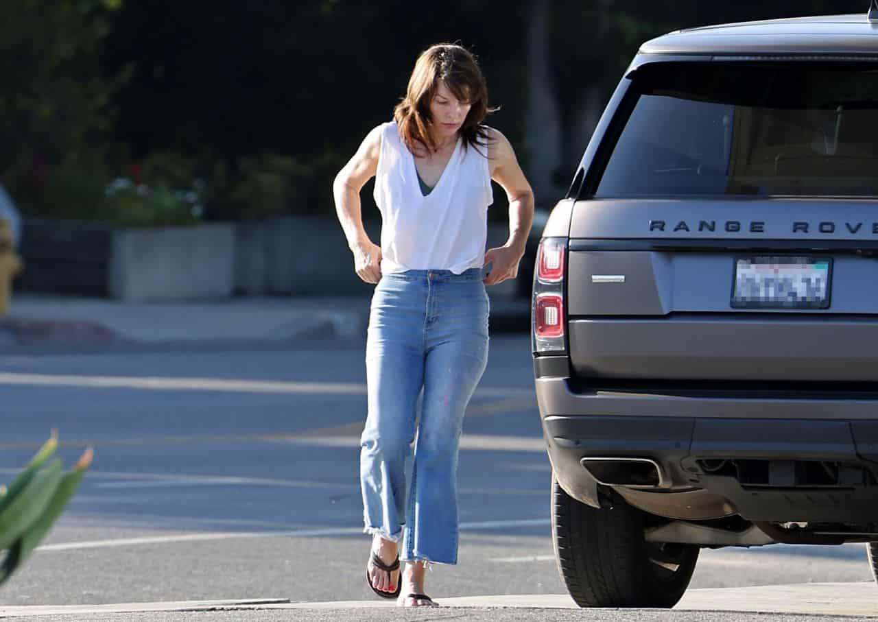 Milla Jovovich Stops at a Gas Station to Fill Up her Tank and Grab a Coffee
