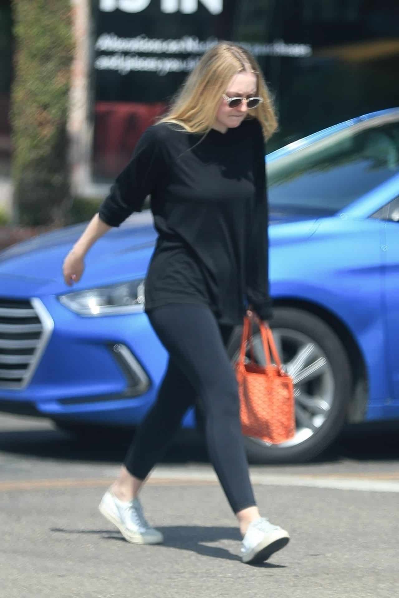 Dakota Fanning Flashes her Hot Figure While Leaving Pilates Class in WeHo