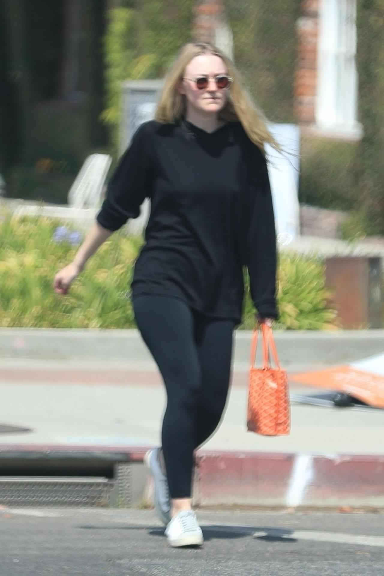 Dakota Fanning Flashes her Hot Figure While Leaving Pilates Class in WeHo