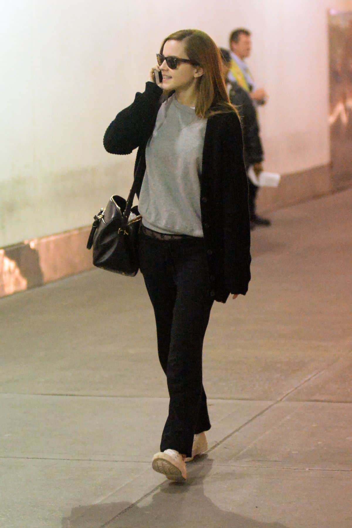 Emma Watson in a Comfy Outfit Exposing her Lace Underwear at JFK Airport