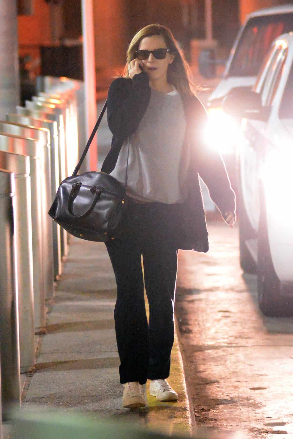 Emma Watson in a Comfy Outfit Exposing her Lace Underwear at JFK Airport