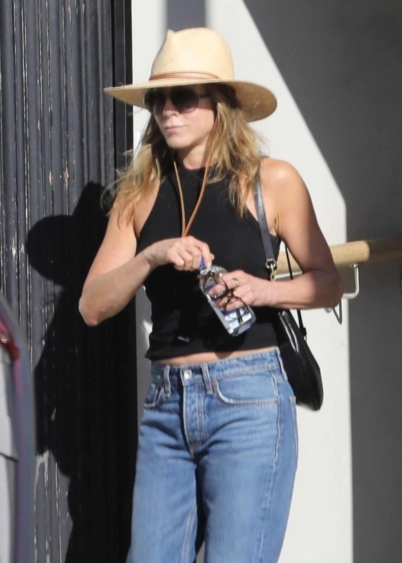 Jennifer Aniston Looks Casual while Leaving the Hair Salon in Beverly Hills