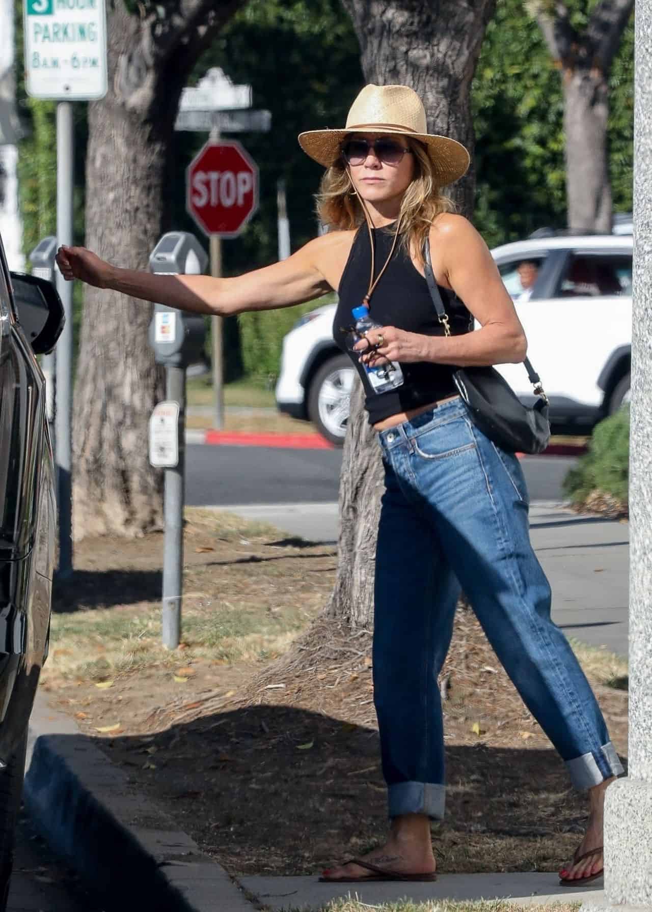 Jennifer Aniston Looks Casual while Leaving the Hair Salon in Beverly Hills