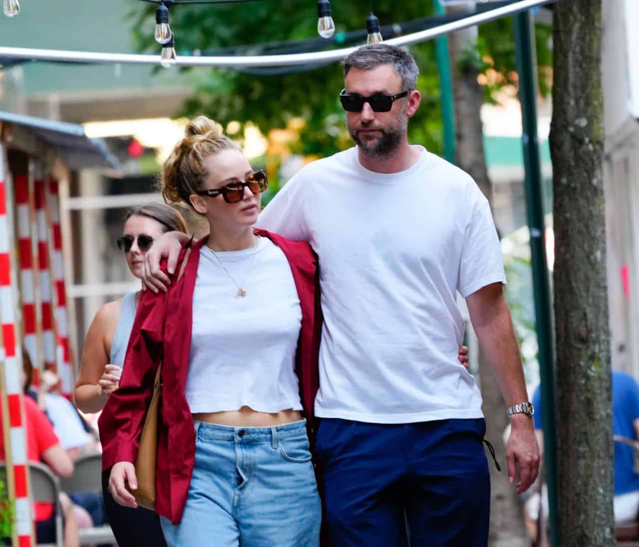 Jennifer Lawrence Wears Baggy Low-Rise Mom Jeans During a Romantic Walk