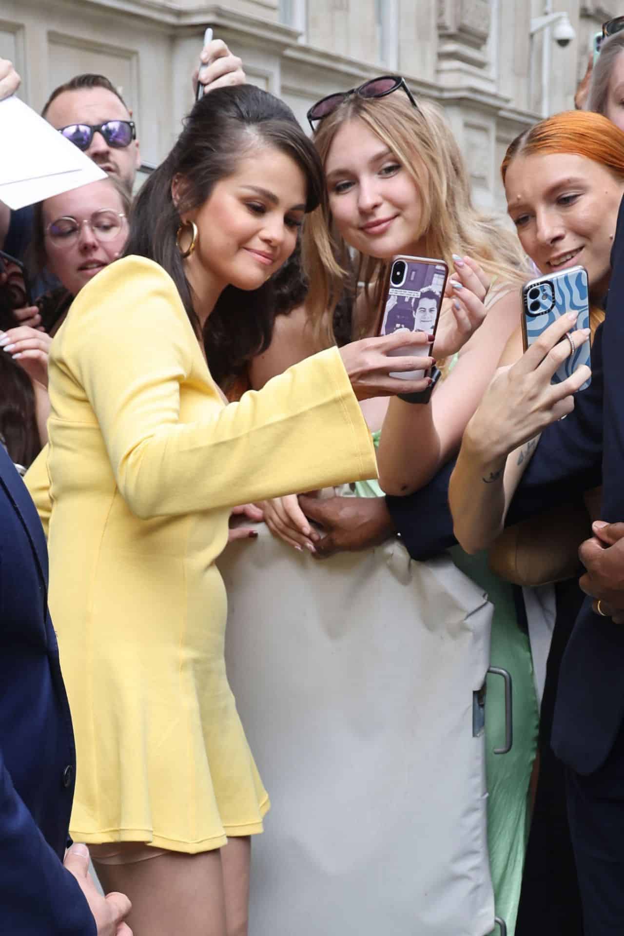 Selena Gomez Hangs Out with Fans Outside The Corinthia Hotel in London