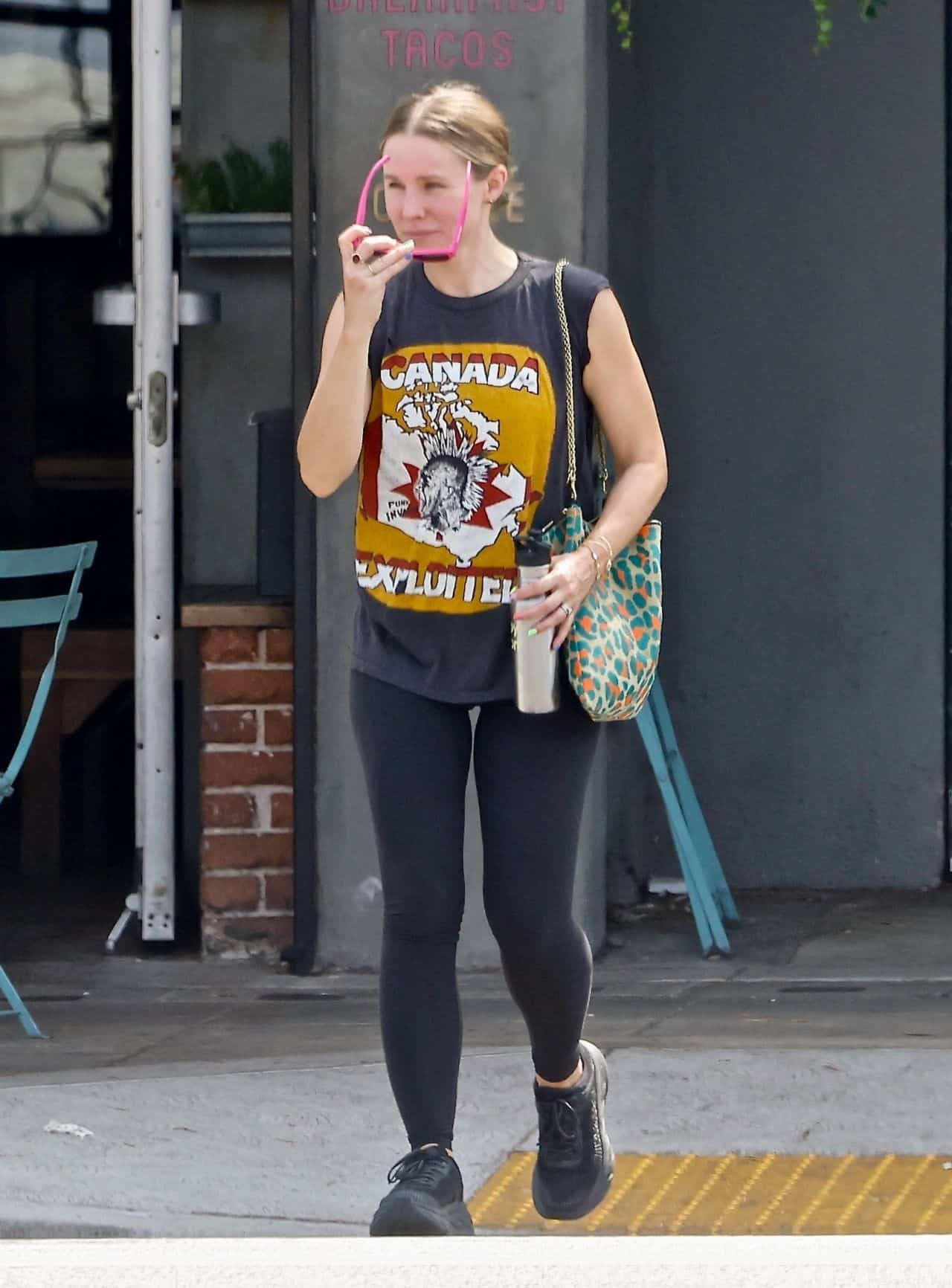 Kristen Bell is Seen Rocking a Black Punk T-shirt after Lunch in Los Feliz