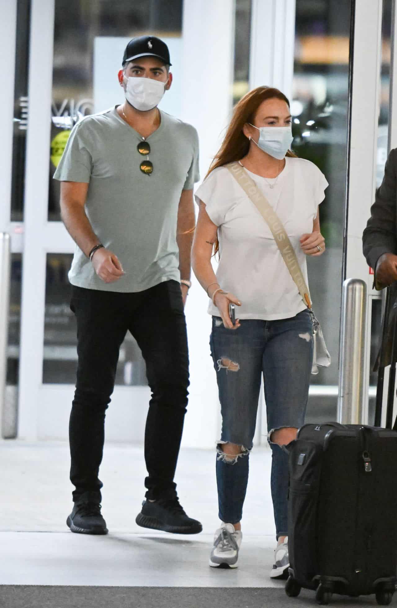 Lindsay Lohan Rocks a Laidback Outfit with her Husband at JFK Airport