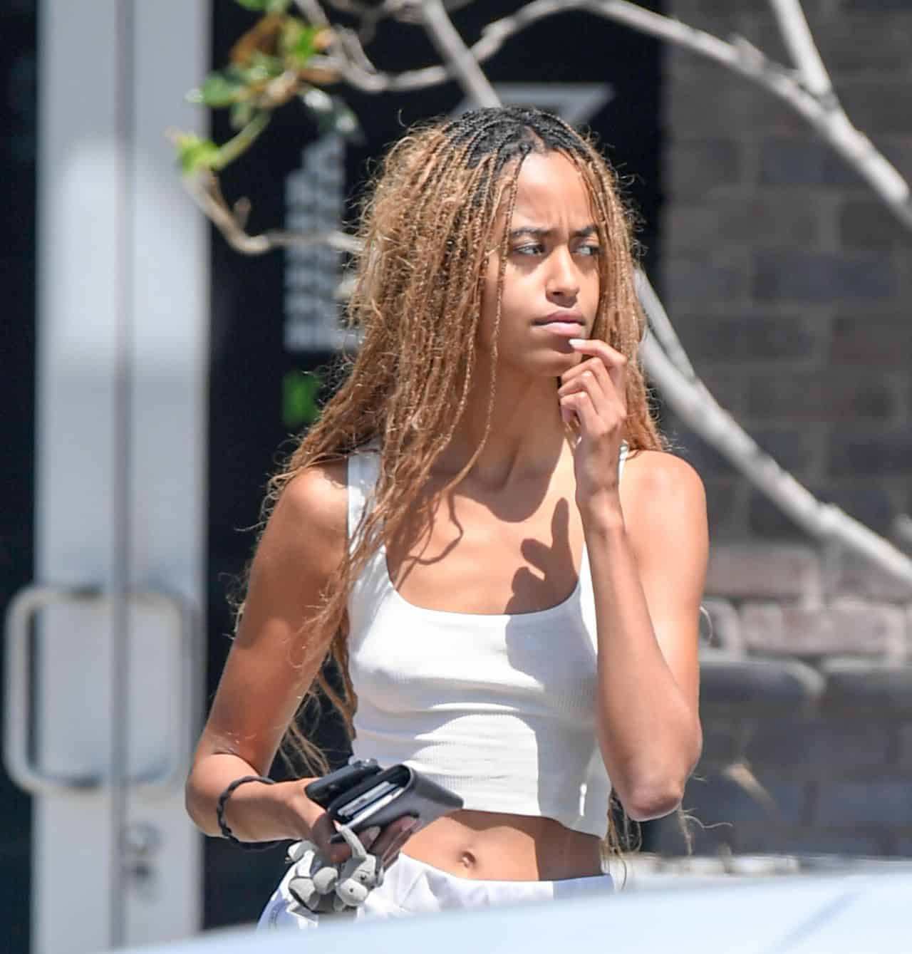 Malia Obama Shows Off Her Figure in Tiny White Shorts and a Skimpy Crop Top