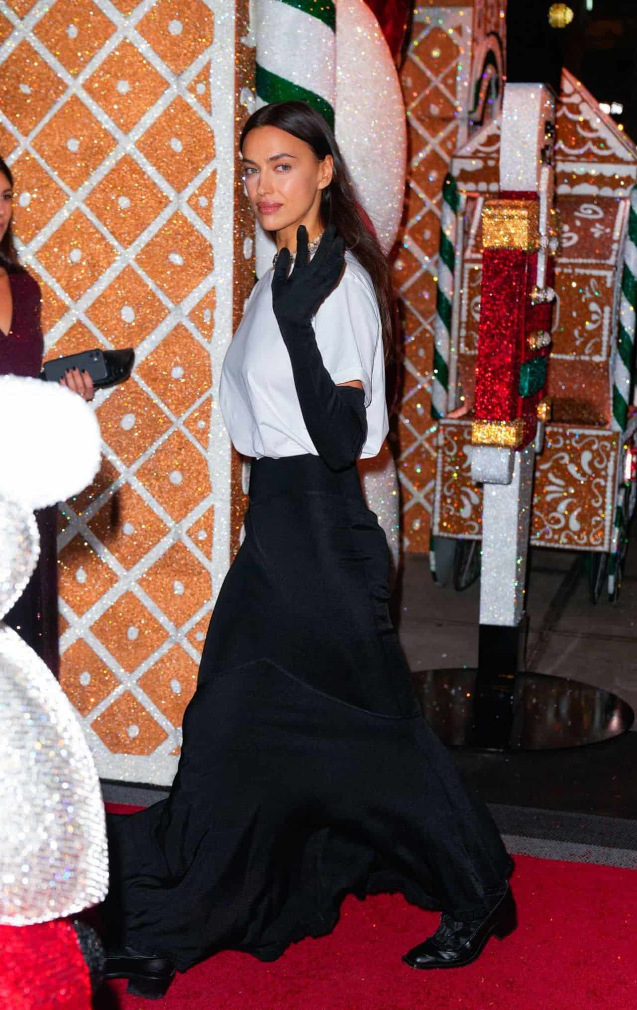 Irina Shayk Wears a Black Fitted Skirt at the Swarovski Holiday Event in NYC