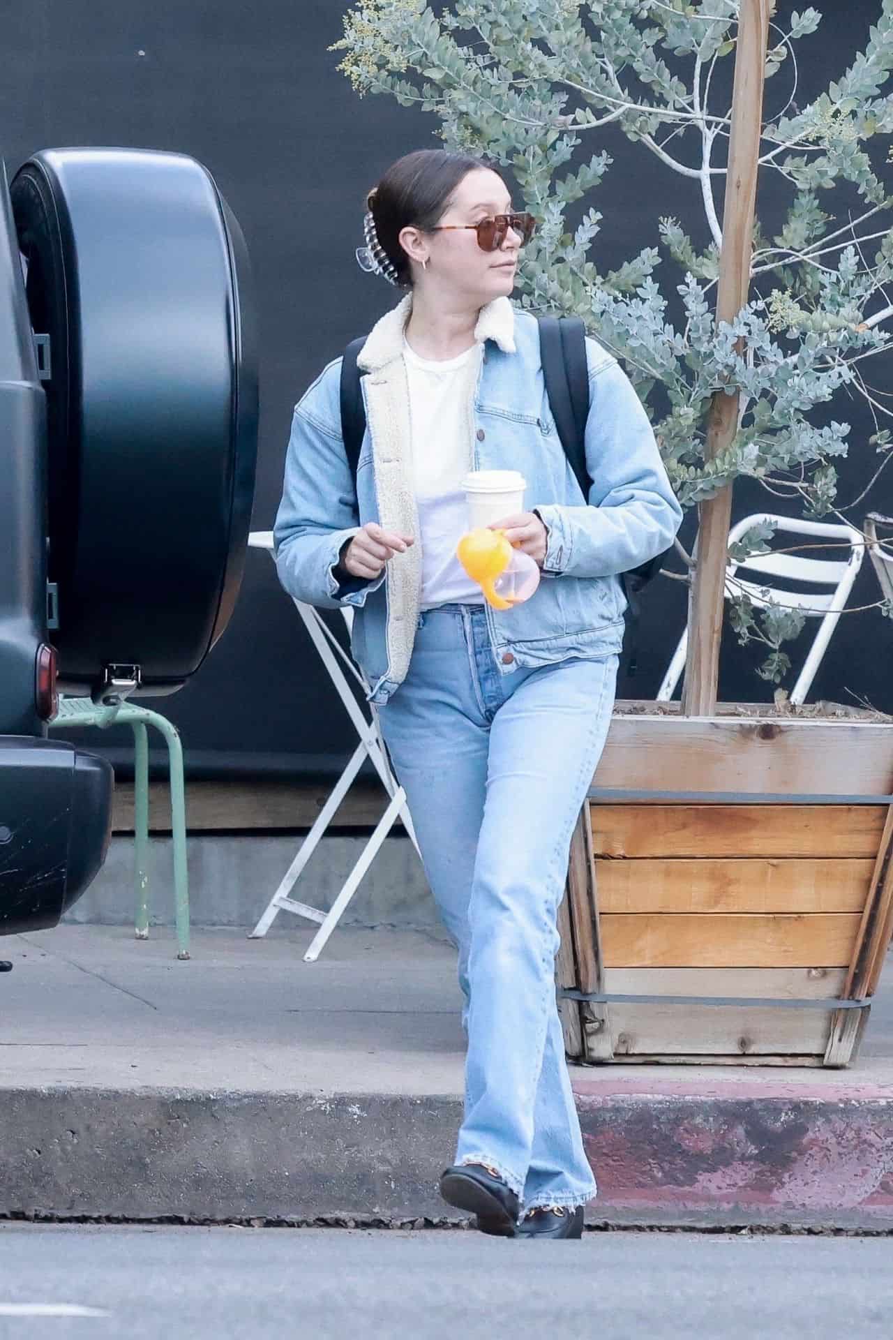 Ashley Tisdale with Husband and Daughter Hits LA in Denim-on-Denim