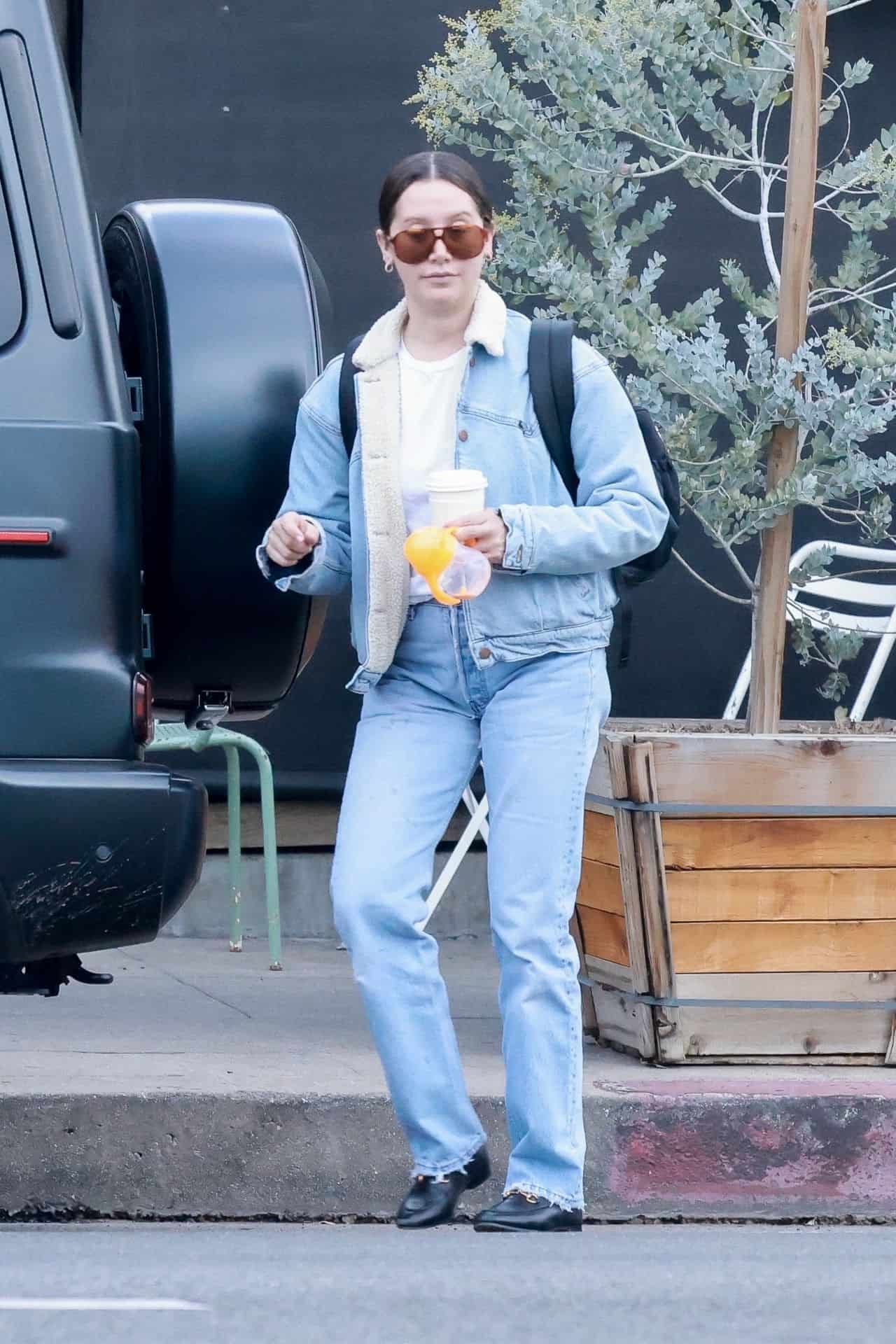 Ashley Tisdale with Husband and Daughter Hits LA in Denim-on-Denim