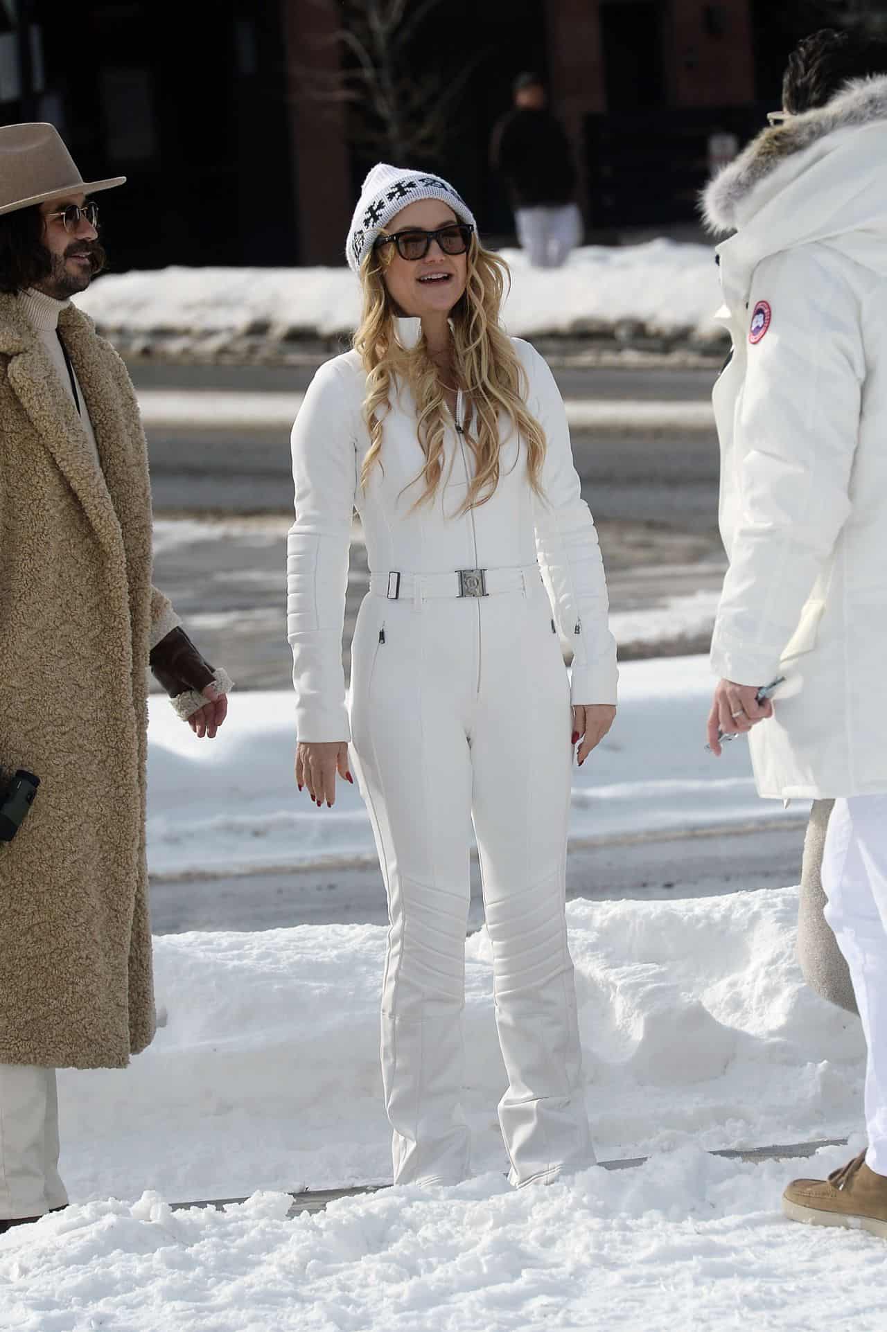 Kate Hudson Looks Stunning in a White Jumpsuit and Beanie in Aspen
