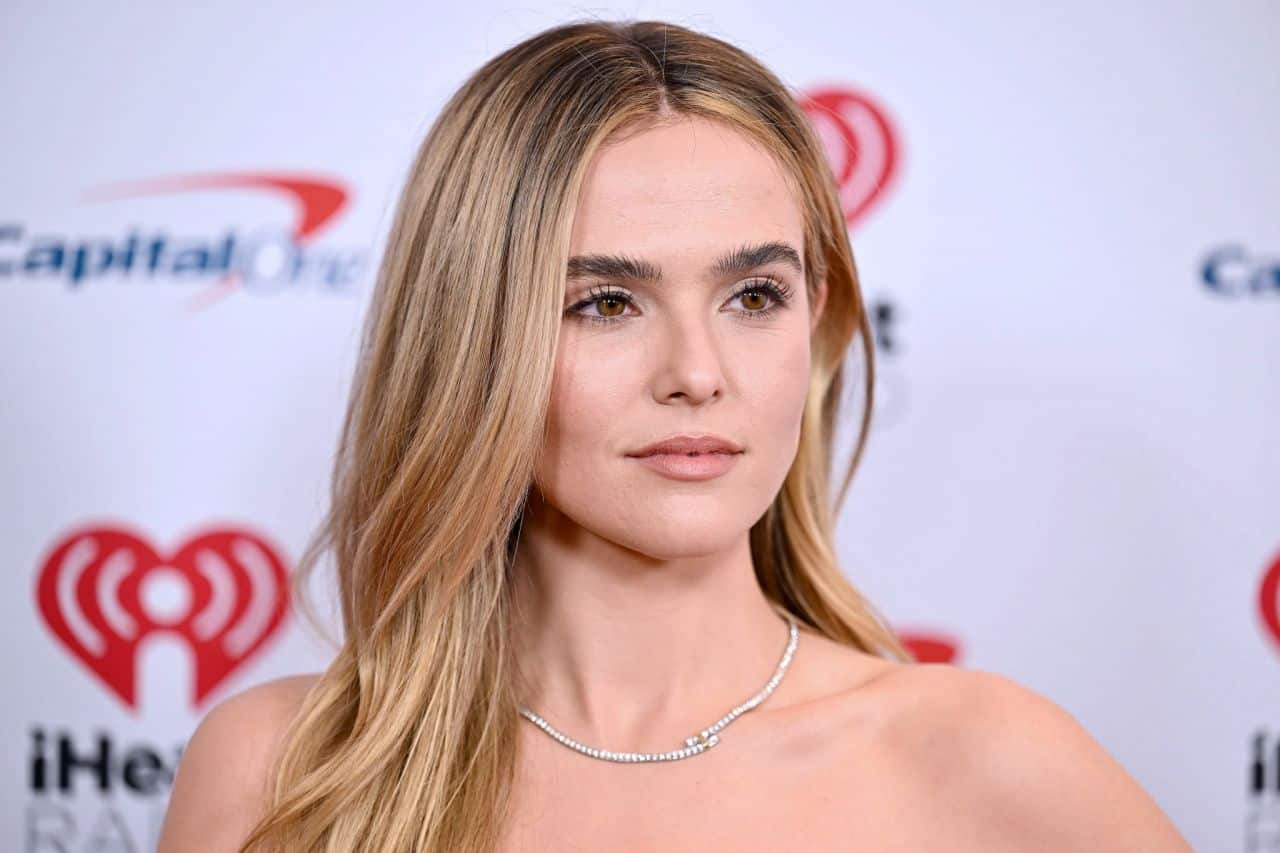 Zoey Deutch Puts on a Leggy Display in an LBD for the 2022 Jingle Ball