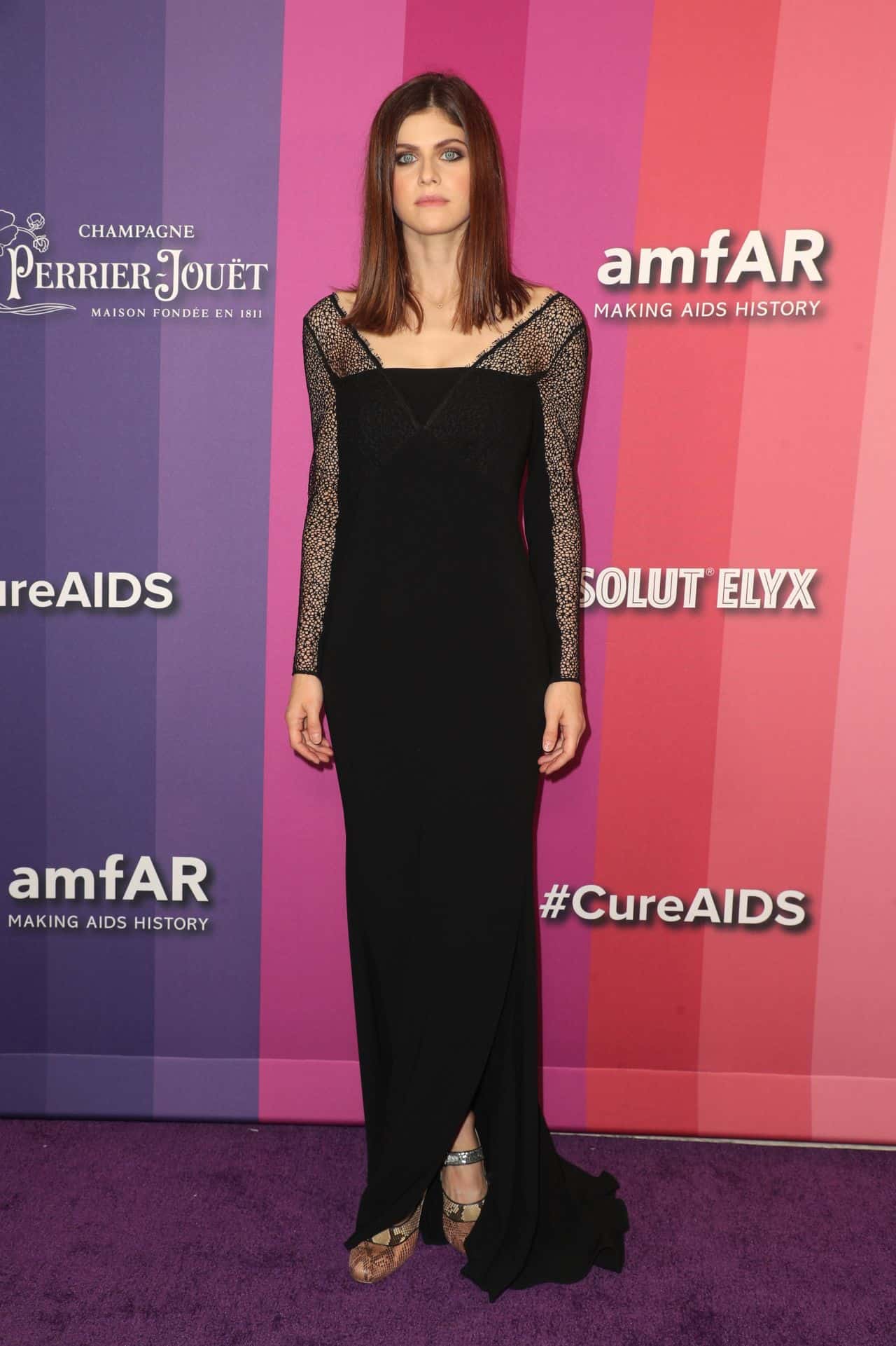Alexandra Daddario Posing in Black Gown at the 2019 amfAR Gala
