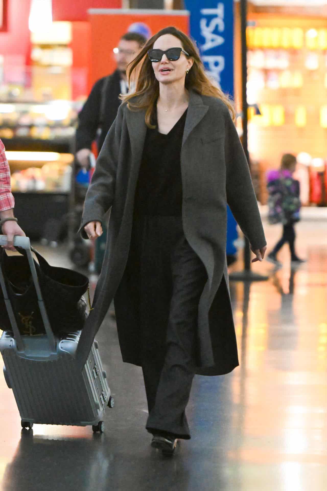 Angelina Jolie Nails the Chic Travel Look in Grey Wool Coat