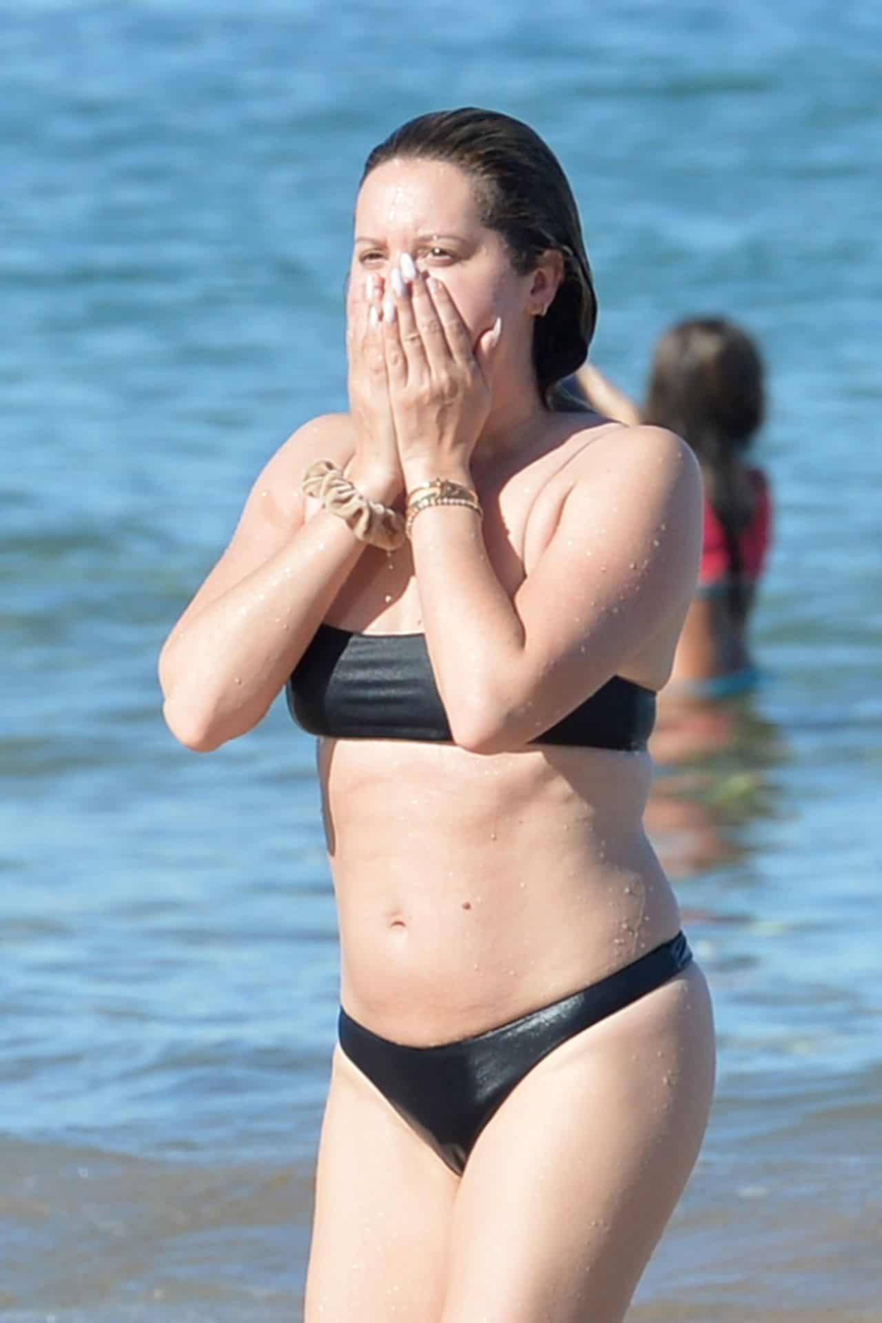 Ashley Tisdale Hits the Beach in a Black Bikini on Maui