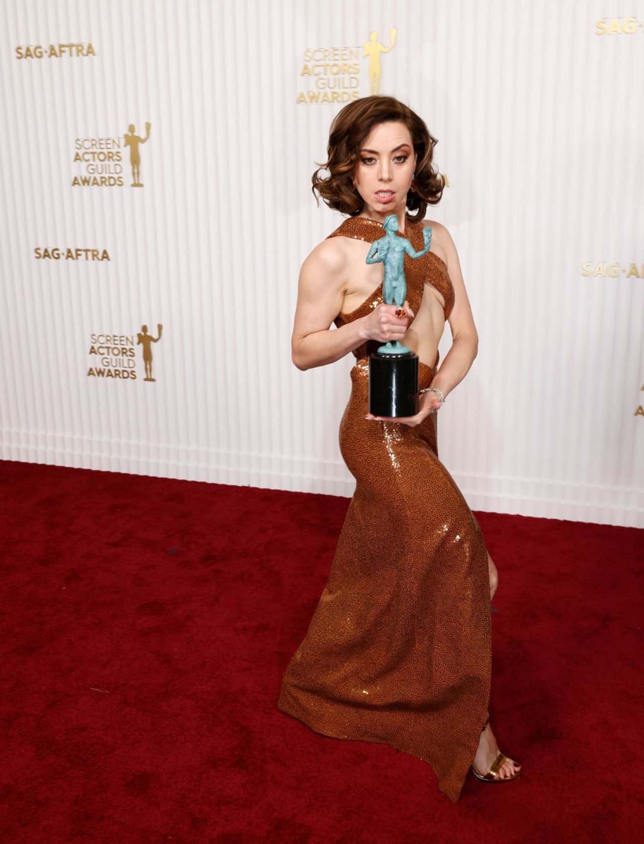 Aubrey Plaza Wears a Daring Gold Gown at the 2023 SAG Awards in LA