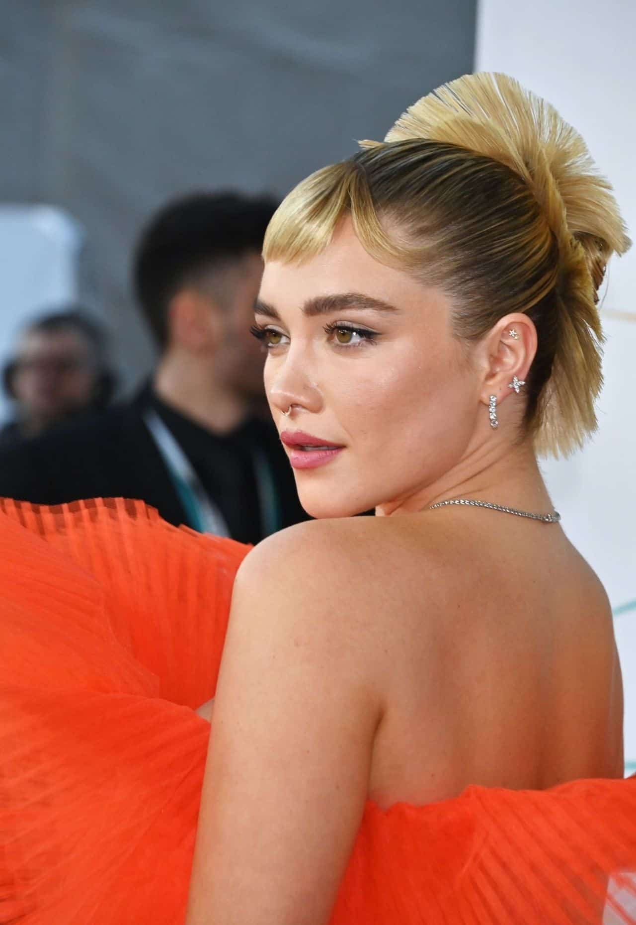 Florence Pugh in the Orange Gown at EE BAFTA Film Awards 2023 in London