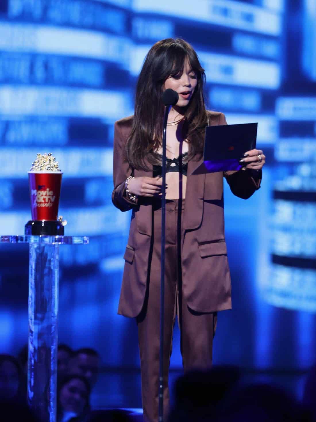 Jenna Ortega Rocks Brown Pantsuit and Black Lace Bra at MTV Awards