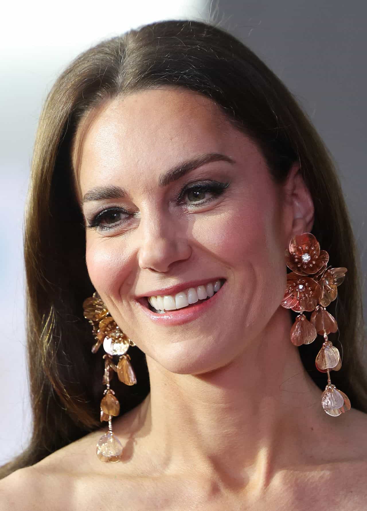 Kate Middleton Dazzles at the BAFTAs in a White Gown and Opera Gloves