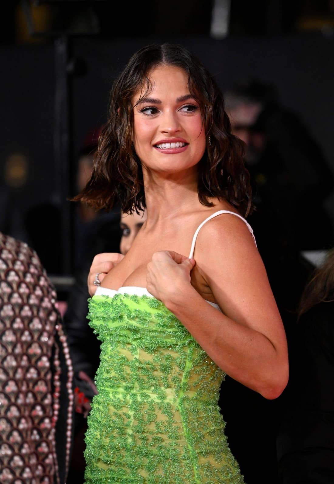 Lily James Steals the Show in Green Dress at "What's Love Got to Do with It?" Premiere