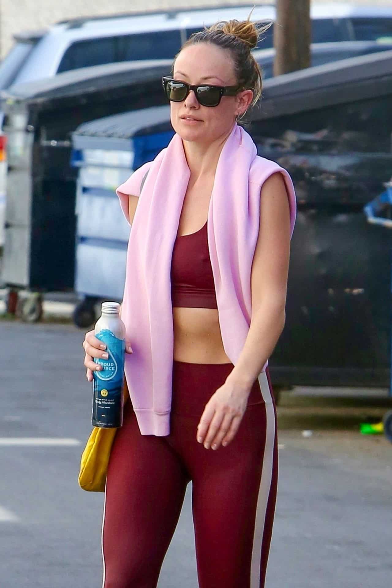 Olivia Wilde Flashes Toned Abs in Maroon Outfit after the Gym