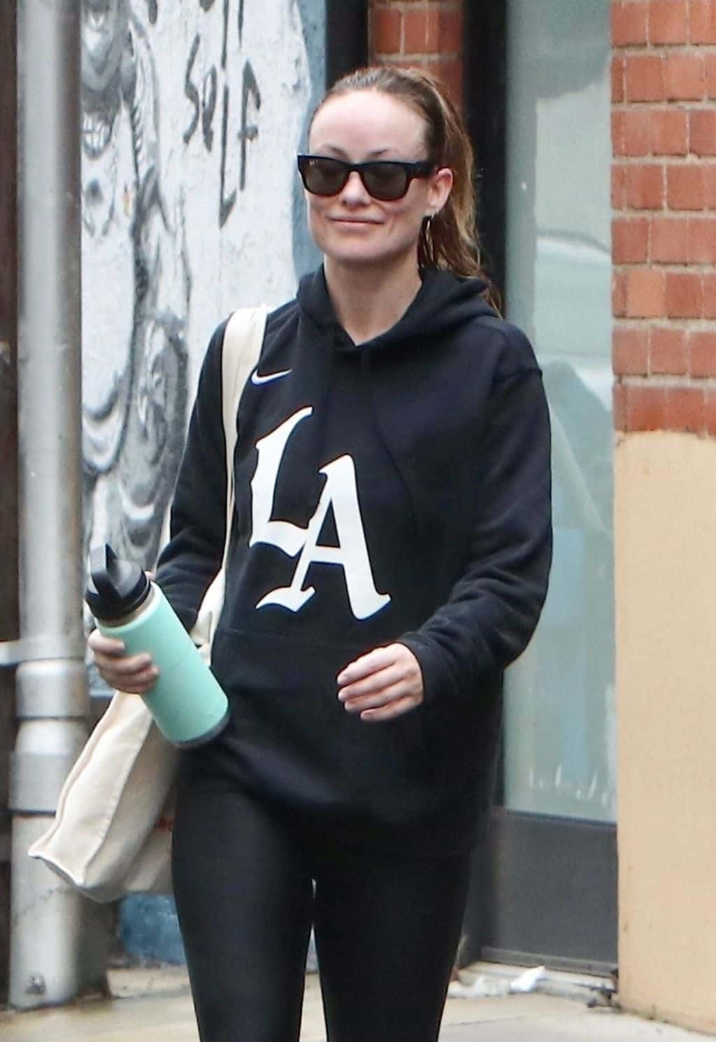 Olivia Wilde Shows Off Shapely Legs in Workout Gear and LA Hoodie
