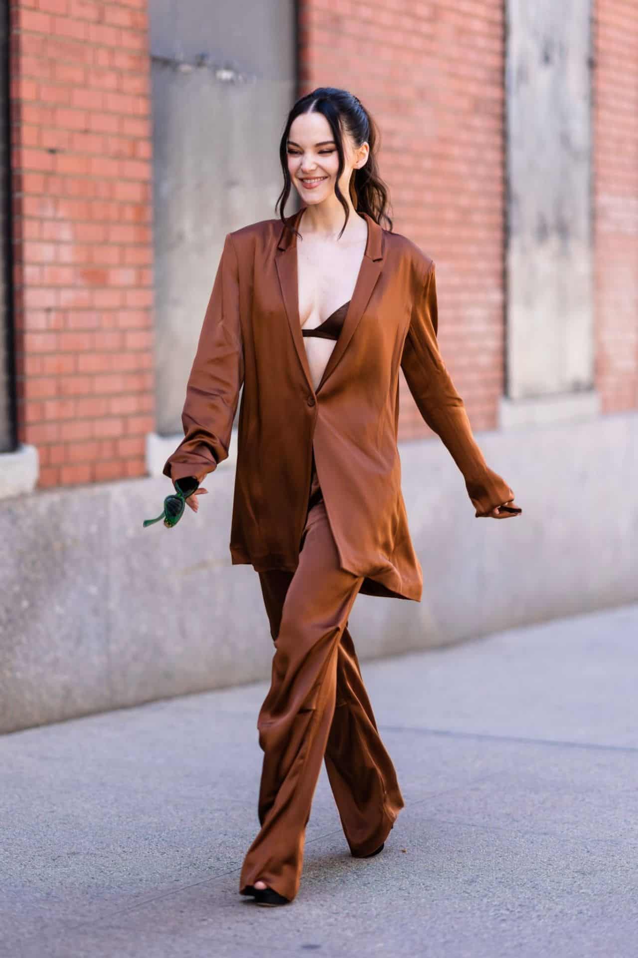 Dove Cameron Nails the Chic Look in Bronze Pantsuit in New York City