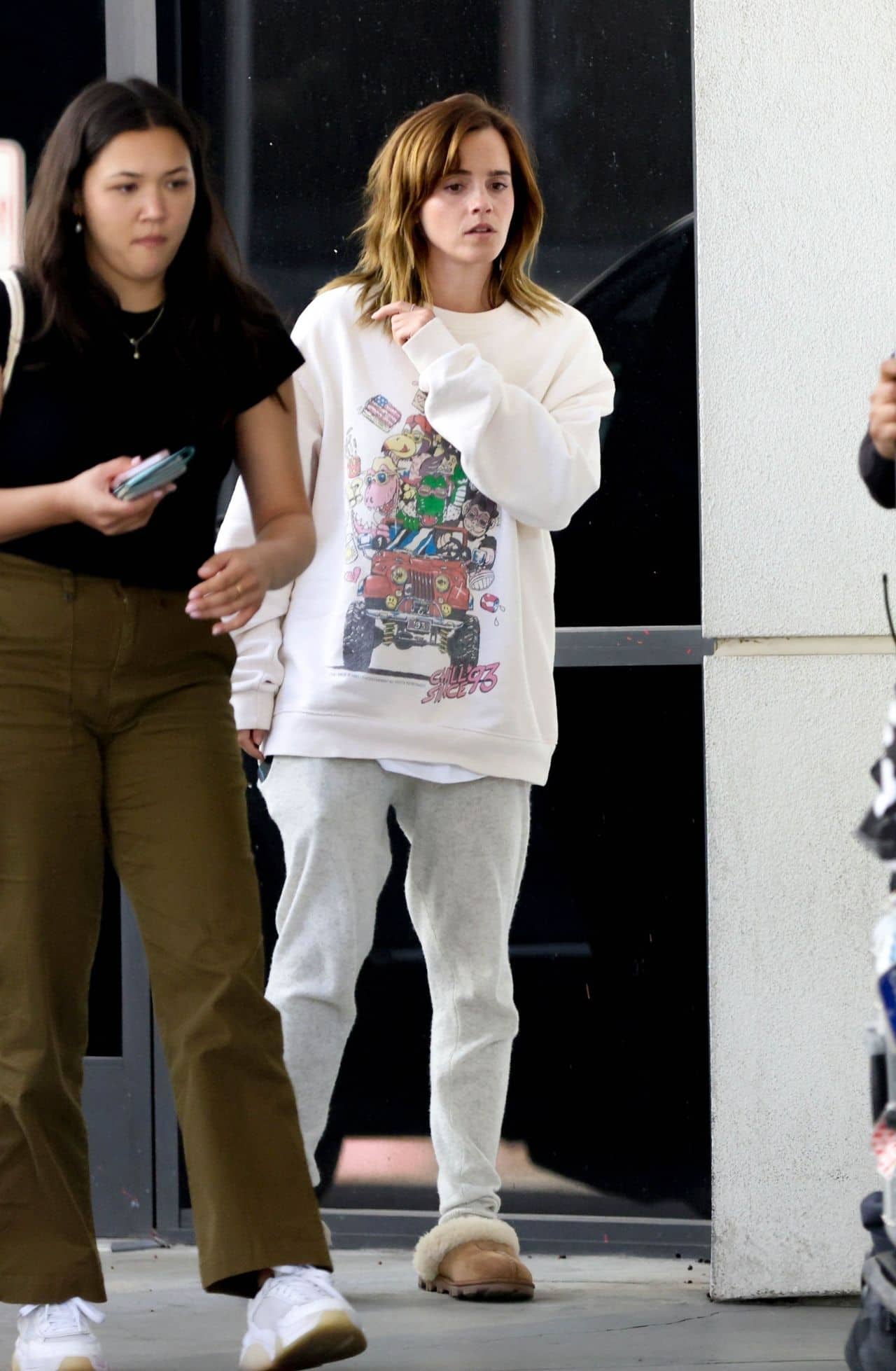 Emma Watson in a Comfy Playful Outfit at the Airport in Van Nuys