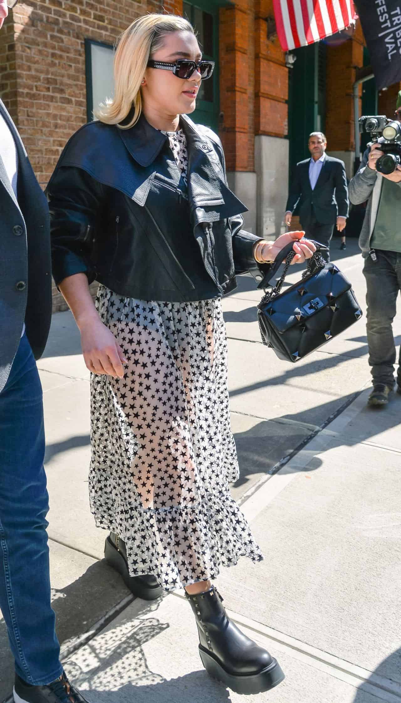 Florence Pugh in a Star-printed Maxi Dress and Leather Jacket in NYC