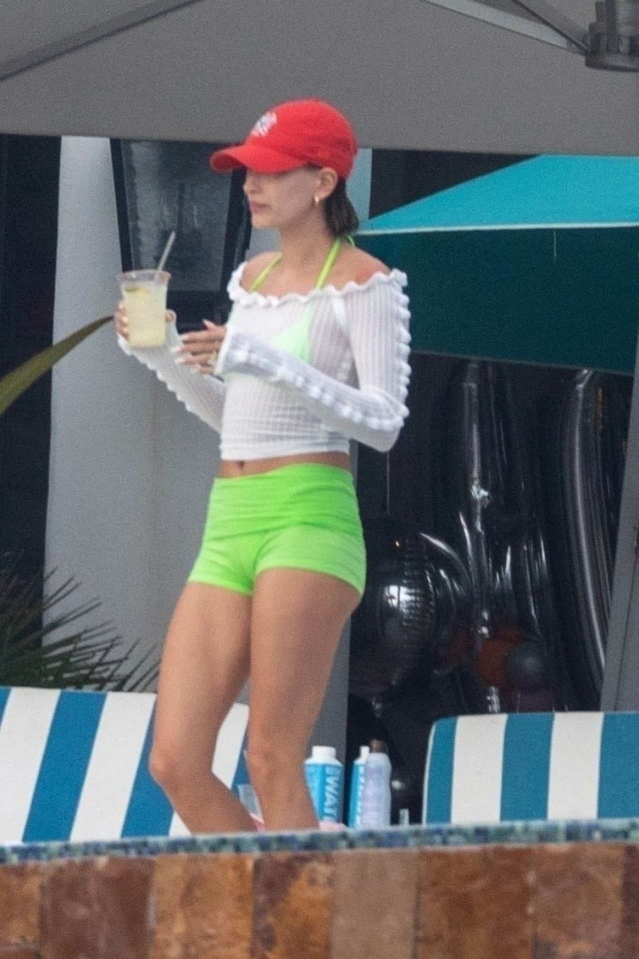Hailey Bieber Shows her Figure in Lime Green Bikini in Cabo