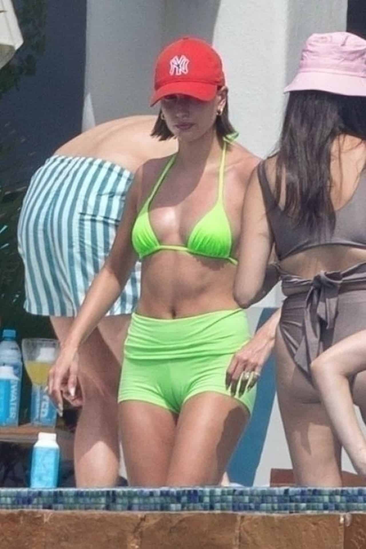 Hailey Bieber Shows her Figure in Lime Green Bikini in Cabo