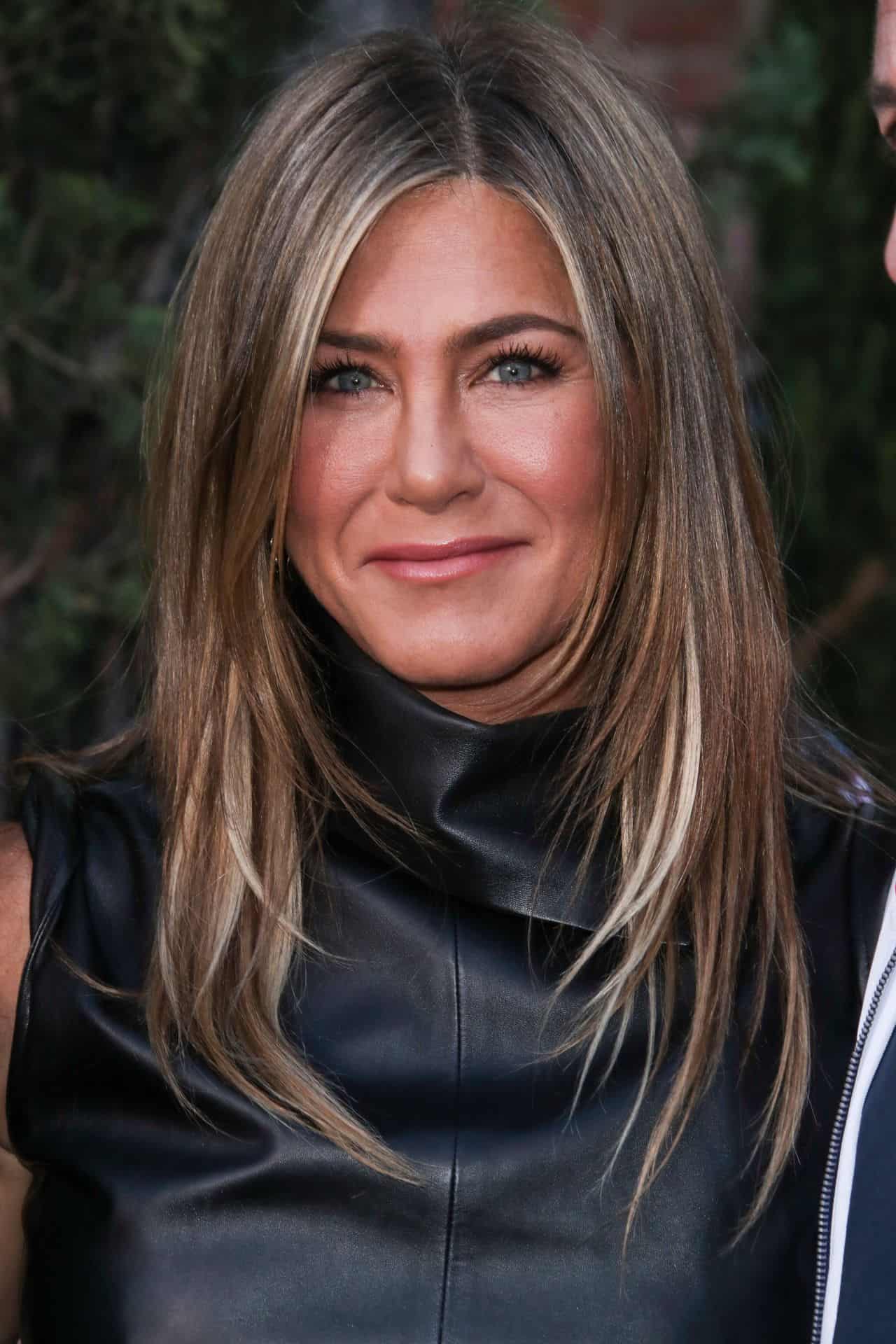 Jennifer Aniston Posing in Leather Mini Dress at Murder Mystery Premiere