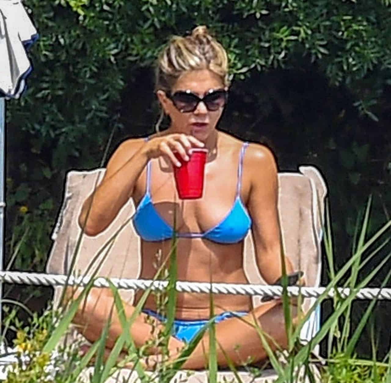 Jennifer Aniston Rocks a Blue Bikini While Relaxing Poolside in Portofino