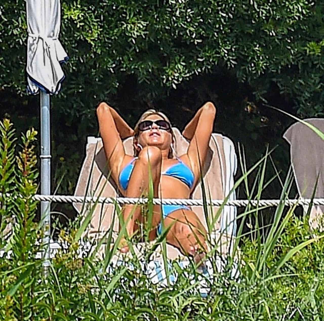 Jennifer Aniston Rocks a Blue Bikini While Relaxing Poolside in Portofino
