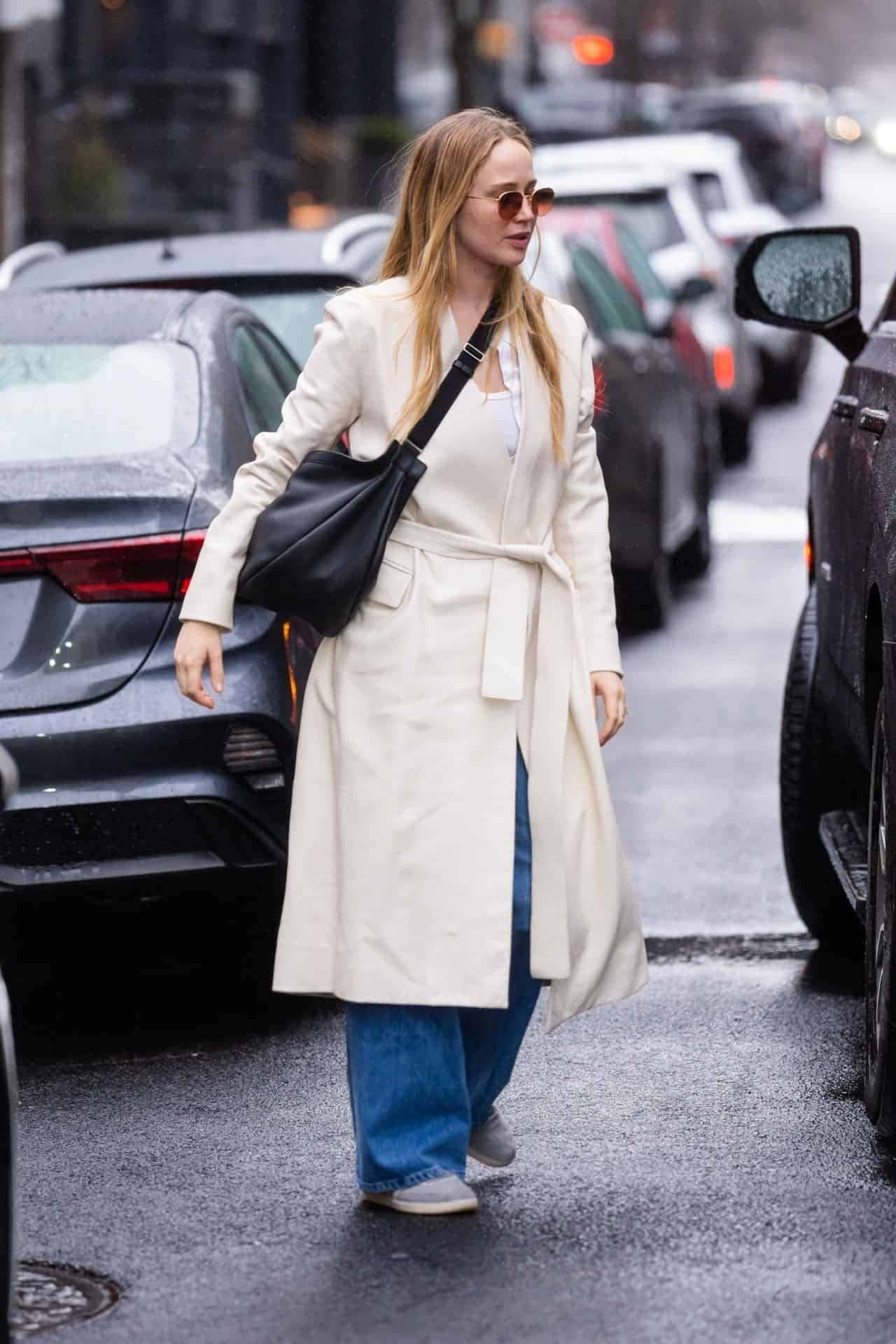 Jennifer Lawrence Pairs Leather Coat with Adidas Samba Sneakers in NYC