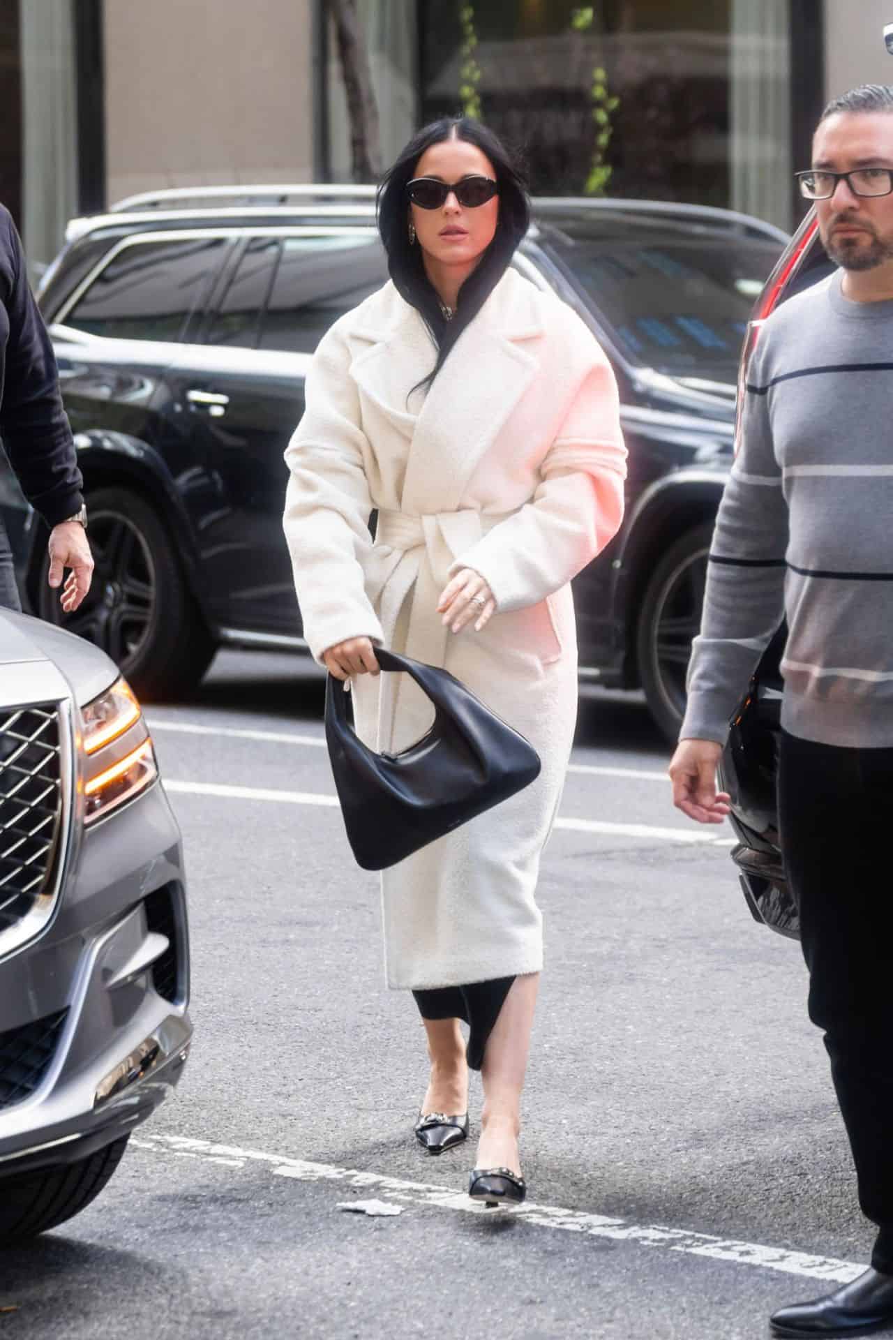 Katy Perry is Effortlessly Stylish in a White Wool Coat and Black Heels