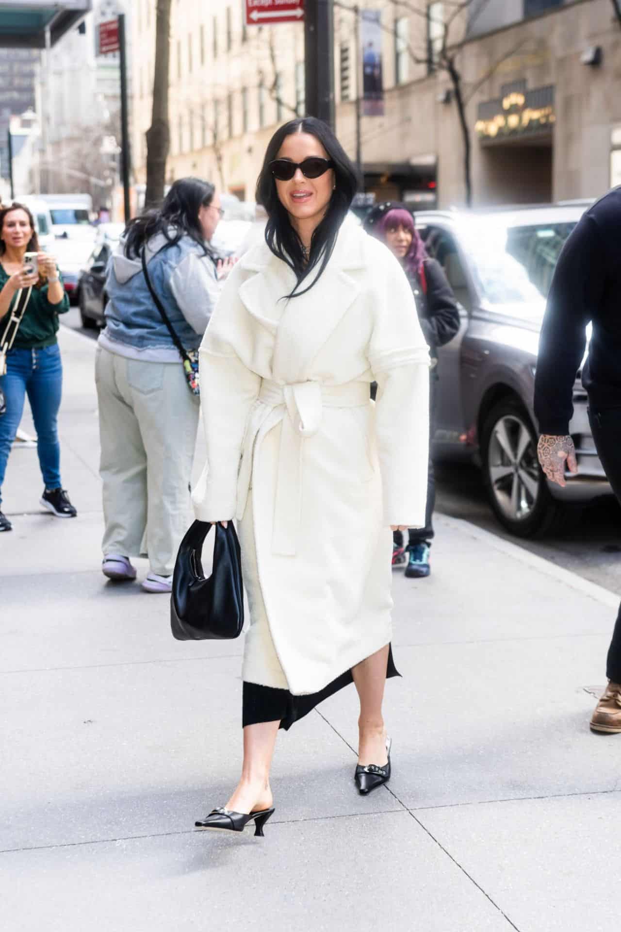 Katy Perry is Effortlessly Stylish in a White Wool Coat and Black Heels