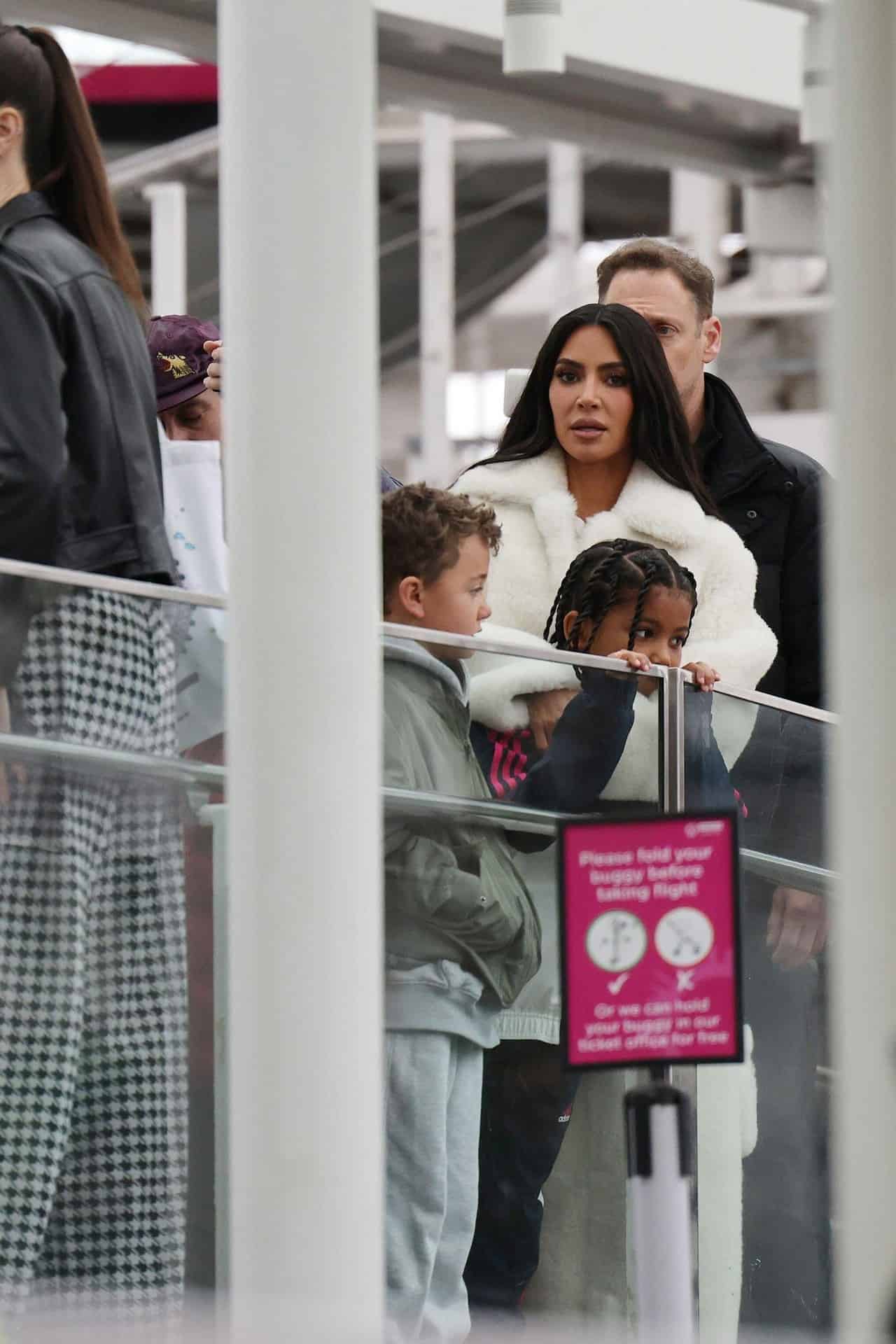 Kim Kardashian Nails a Minimalistic Chic Look in London with Kids