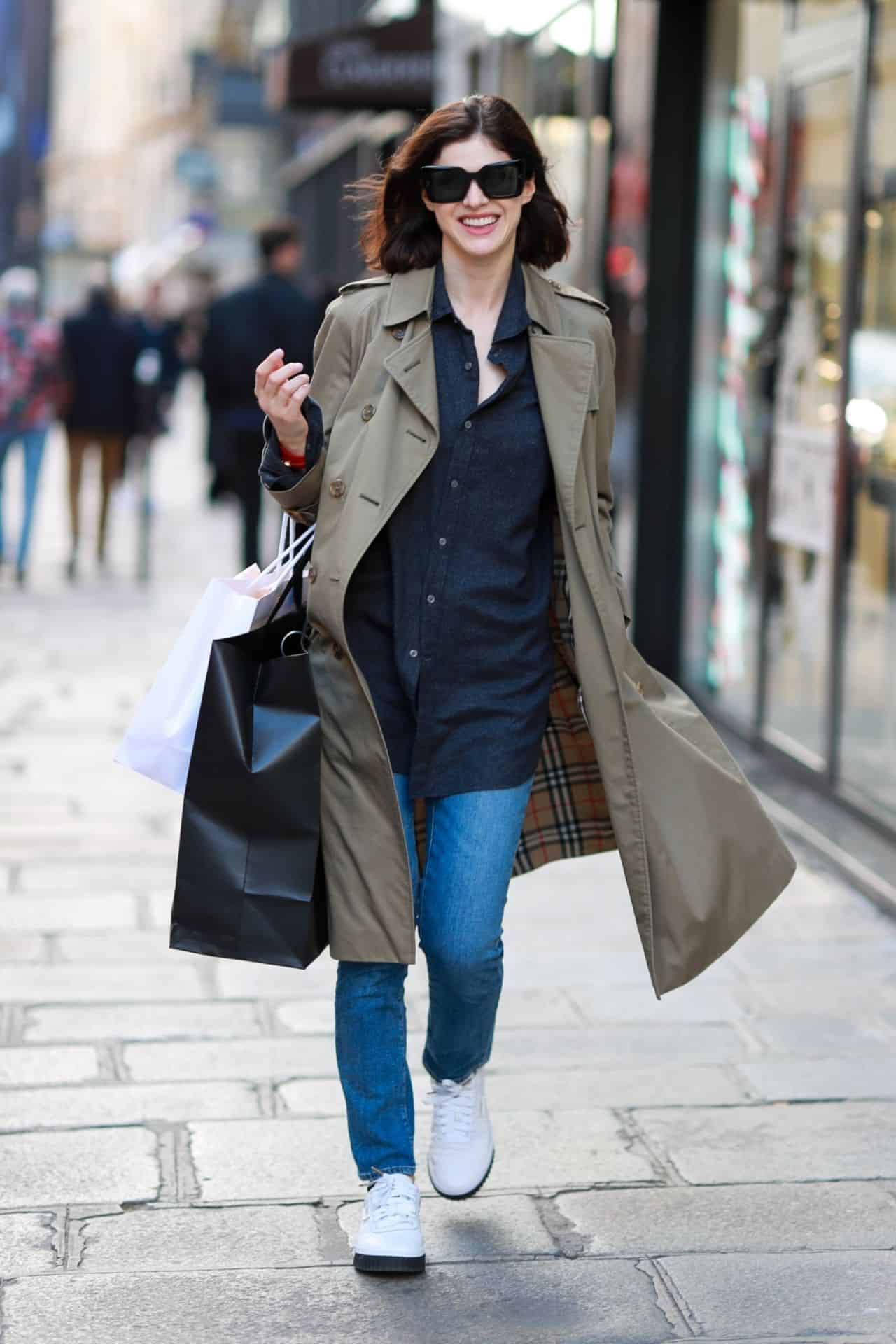 Alexandra Daddario Turns Heads in a Gray Coat While Shopping in Paris
