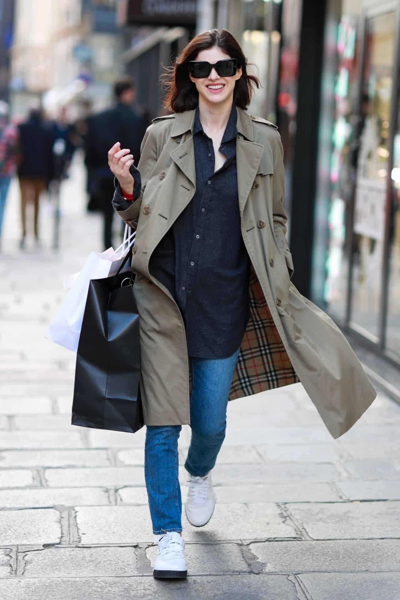 Alexandra Daddario Turns Heads in a Gray Coat While Shopping in Paris