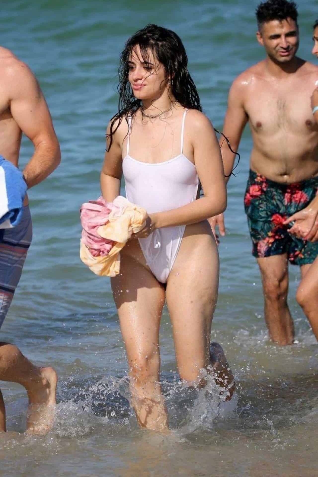 Camila Cabello Turns Up the Heat at the Beach in a White Swimsuit