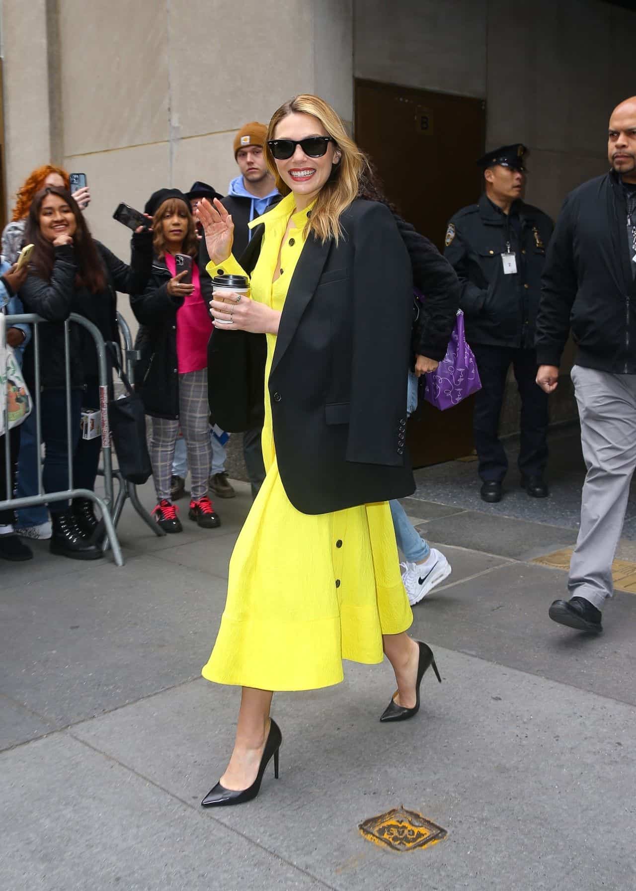 Elizabeth Olsen Wows in Yellow Midi Dress for Today Show