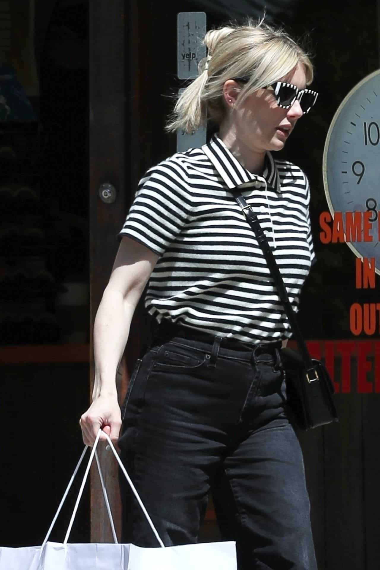 Emma Roberts Runs Errands in a Striped Shirt and Matching Sunglasses