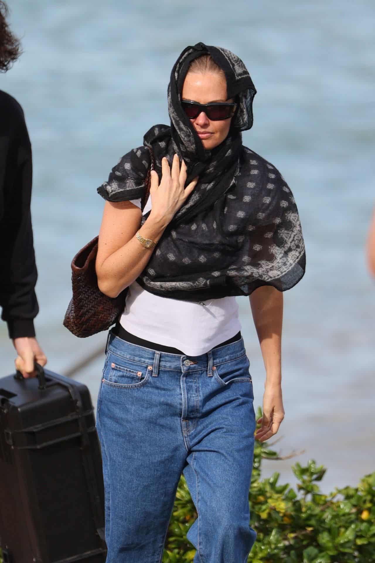 Lara Worthington Grabs Attention in Blue Swimsuit on the Beach in Cronulla