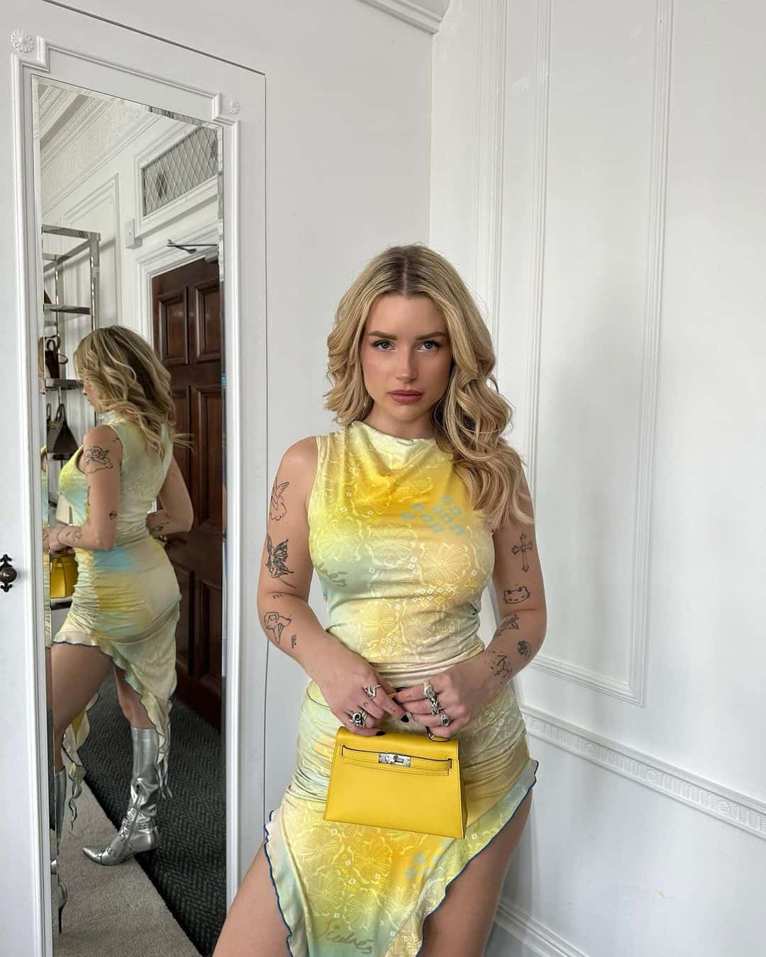 Lottie Moss Poses in a Figure-Hugging Yellow Dress and Silver Boots