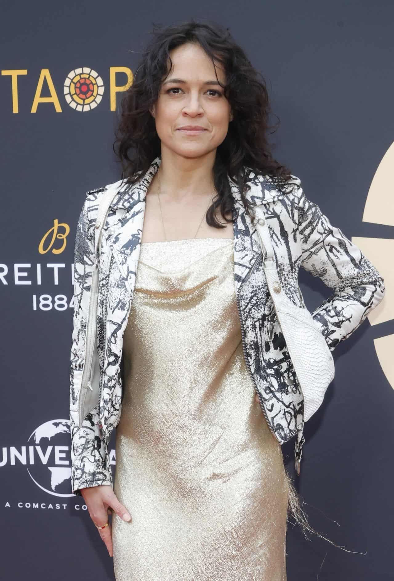 Michelle Rodriguez Rocks the Red Carpet in a Gold Dress and Leather Jacket